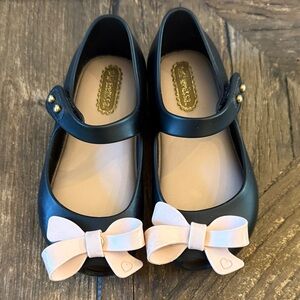 Mini Melissa Black Dress Shoes with Cream Bow